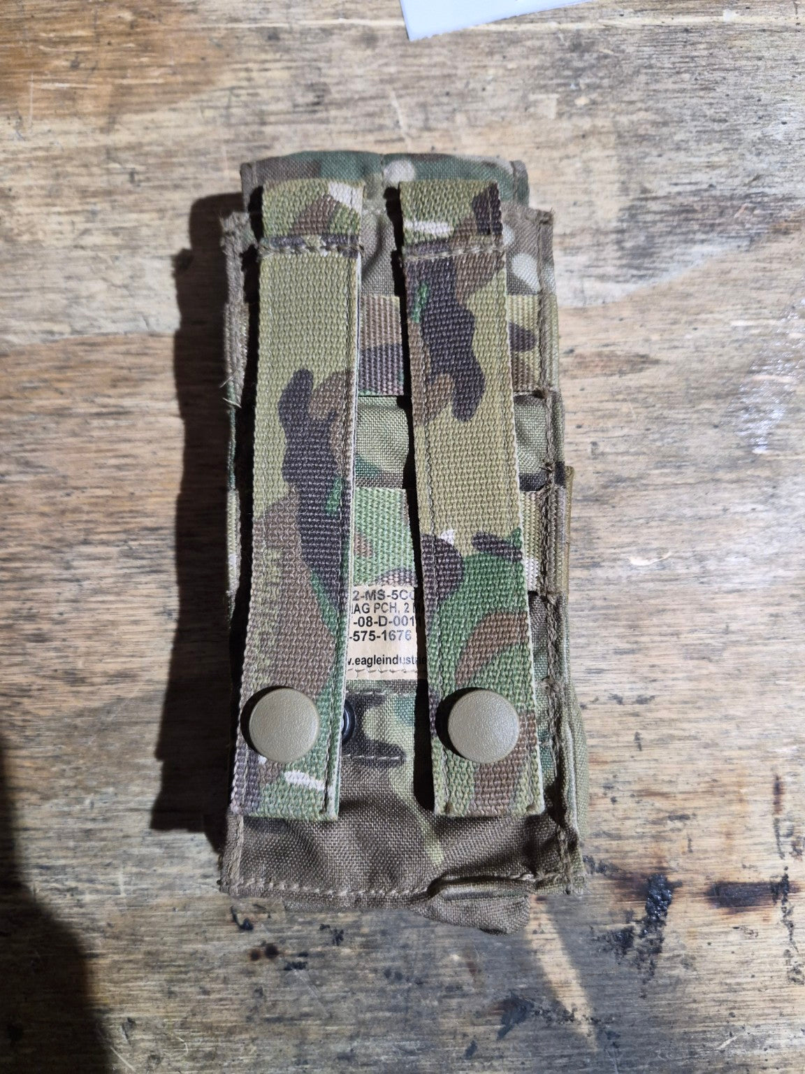 Original rear view of Eagle Industries MultiCam pouch showing two MOLLE straps and snap fasteners