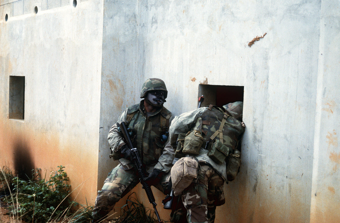 Historical reference: U.S. Marines wearing belt web gear during training in Okinawa, 16 January 1992; NARA 6482532