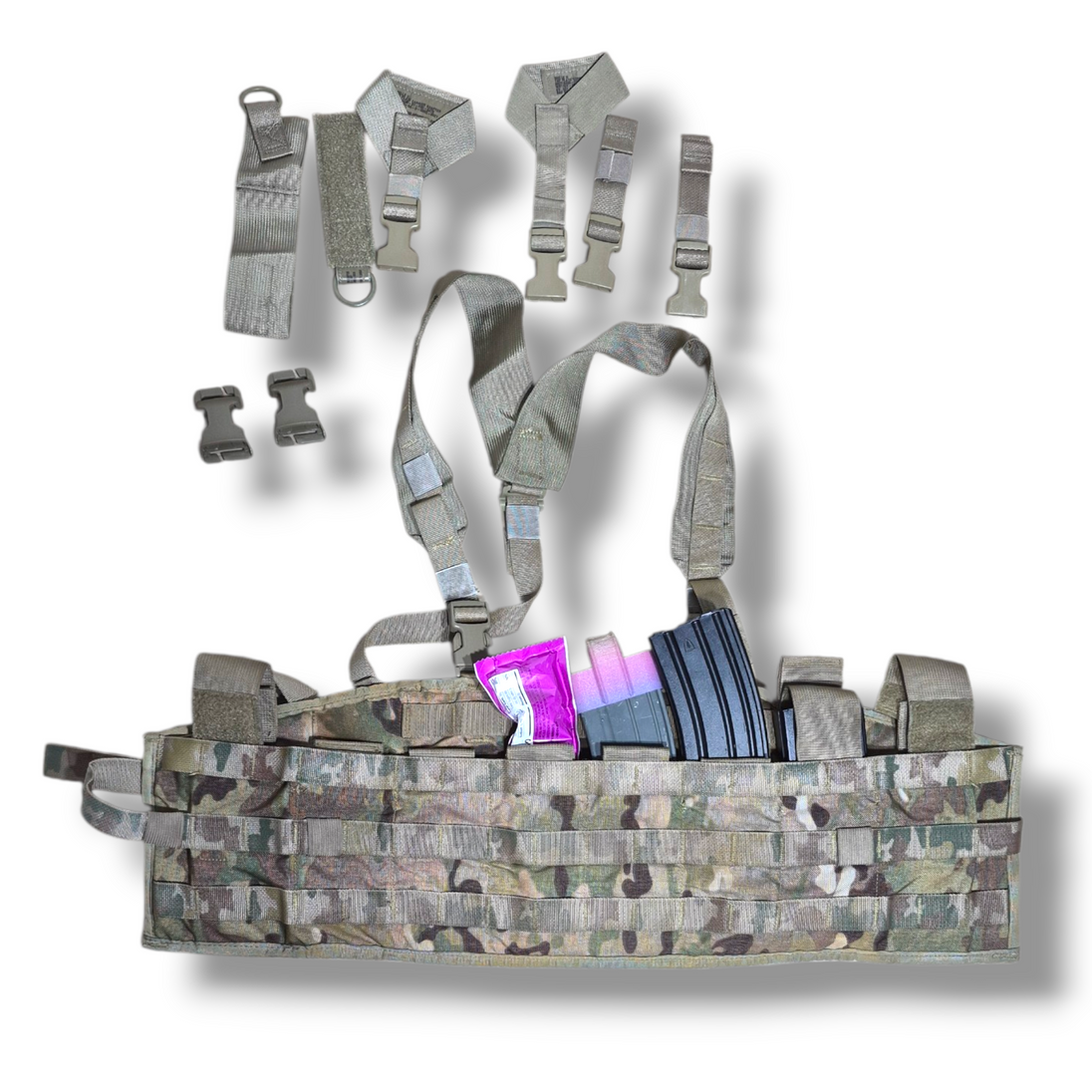 Multicam tactical vest with ammunition pouches and straps on a white background