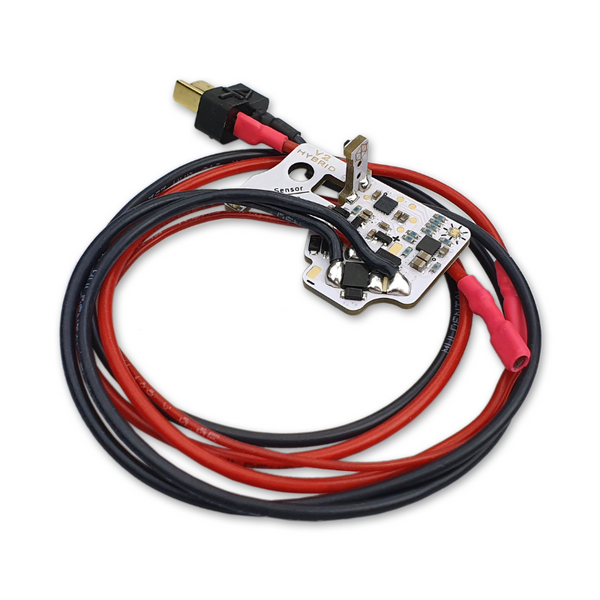 Circuit board with red and black wires on a white background