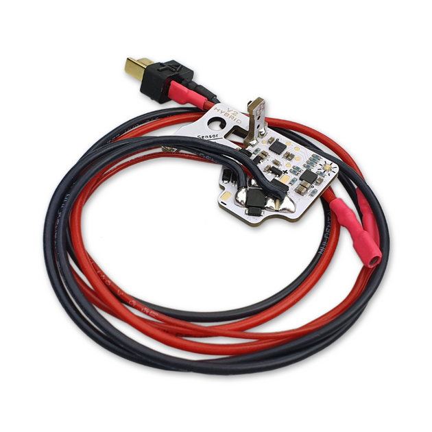 Circuit board with red and black wires on a white background