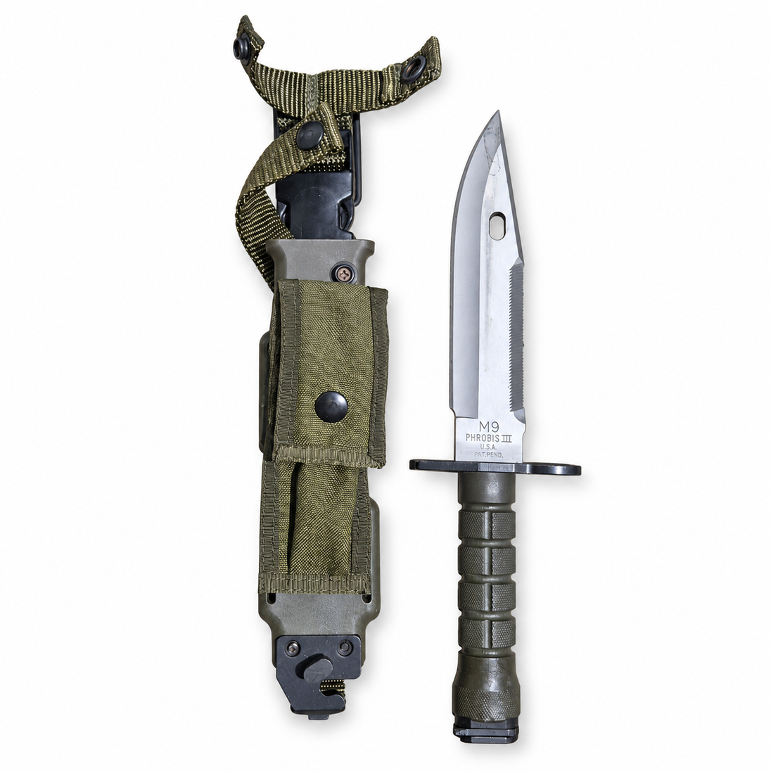 Phrobis III M9 bayonet beside its olive-drab scabbard, showing the four-line maker marking.