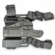 Complete foliage-green holster rig with thigh platform, straps and single magazine carrier.
