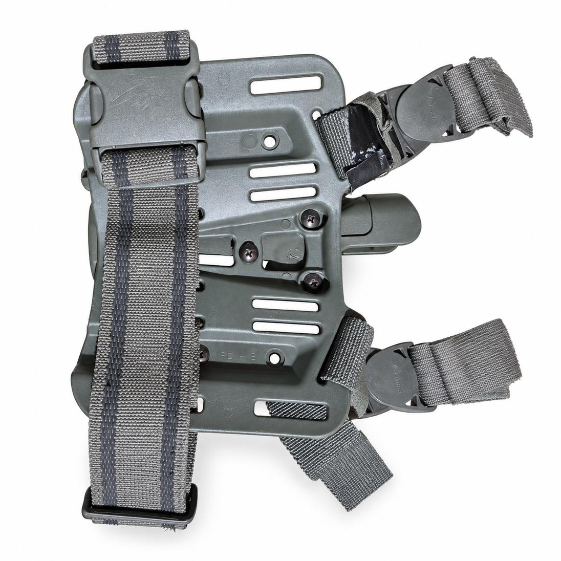 Rear holster thigh platform showing strap routing and mounting screws.