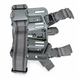 Rear holster thigh platform showing strap routing and mounting screws.