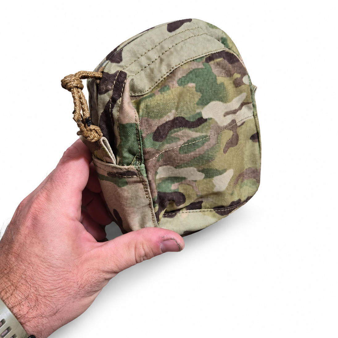 Used Persistent Systems Dual PTT System camouflage pouch held at a front angle with zipper pull visible
