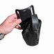 Front angle of used black Safariland holster with assembled belt mount