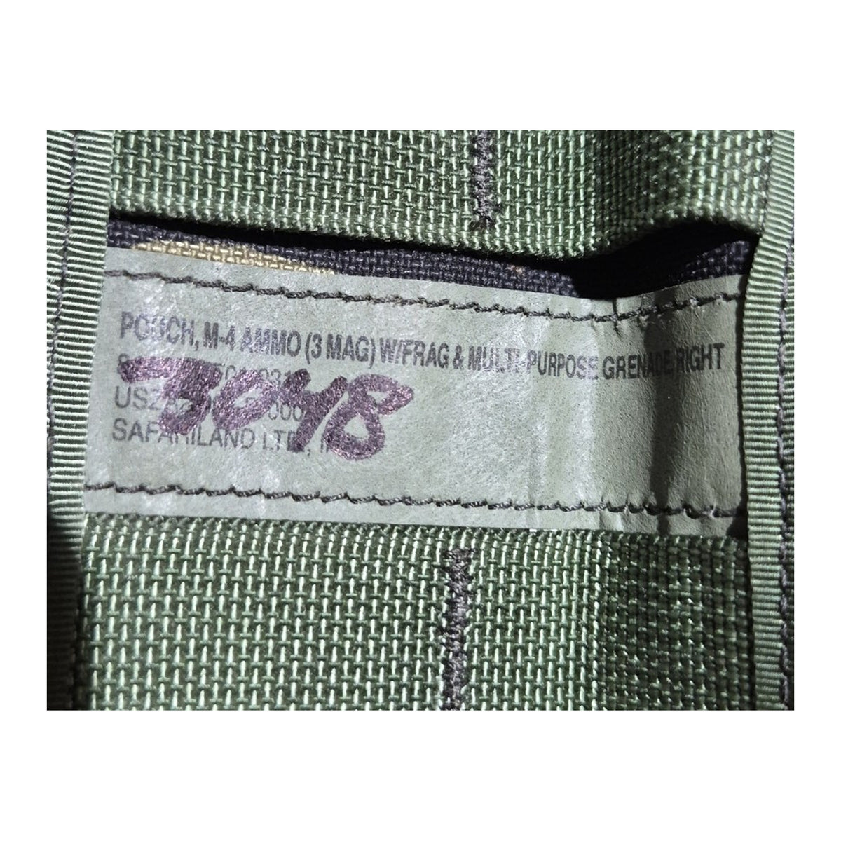 Original Safariland label reading M-4 ammo 3 mag with frag and multipurpose grenade, right, with surplus inventory markings