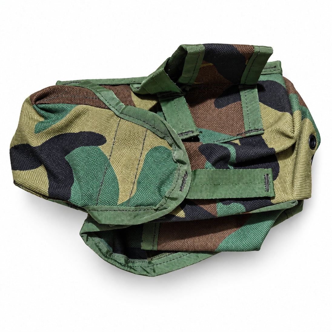 Side view of woodland Safariland triple M4 magazine pouch and integrated accessory pockets