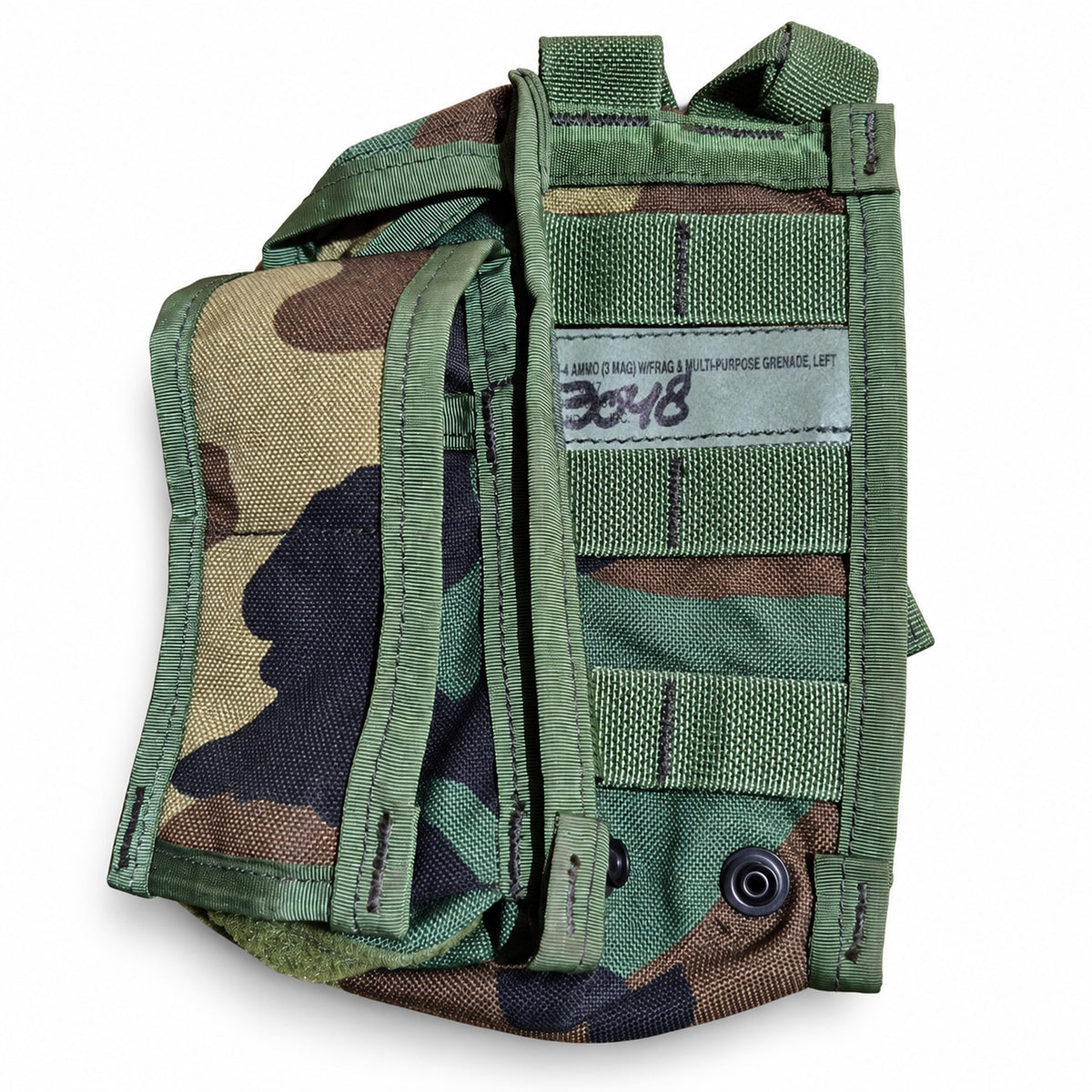 Left-side Safariland woodland ELCS pouch with original label detail and rear attachment webbing